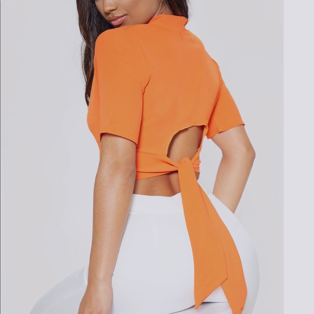 Orange crop top that ties in the back